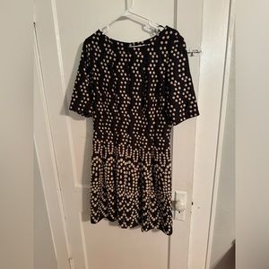 Excellent condition Women’ Gabby Skye black dress with Gold polka dots Size 12